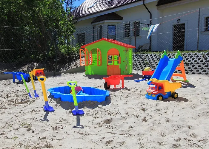 Деревянный коттедж Biale Domki Янтар